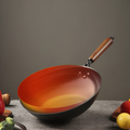 Interior view of 30cm/32cm/34cm coating-free iron wok with heat-treated gradient finish, designed for even heat distribution.