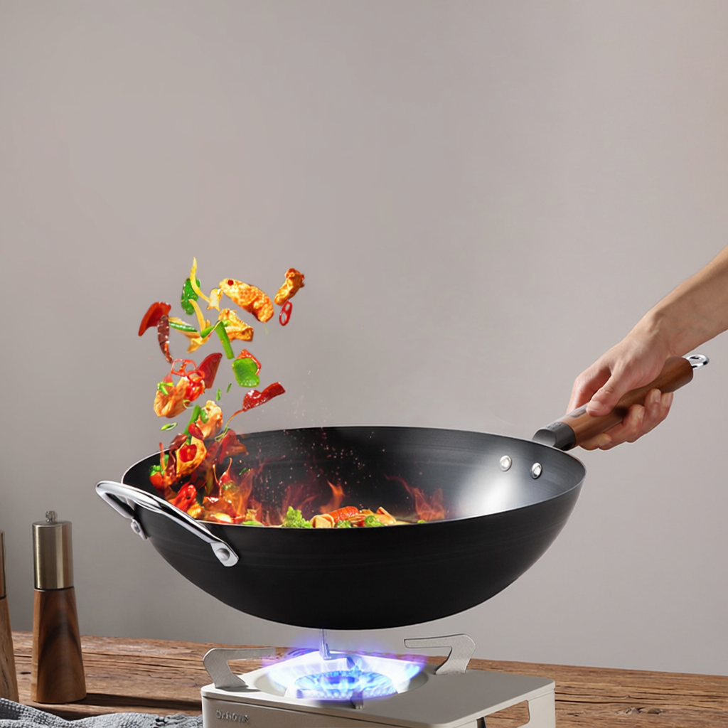 34cm nitrided iron wok stir-frying vegetables over open flame, showcasing heat resistance and ergonomic wooden handle.