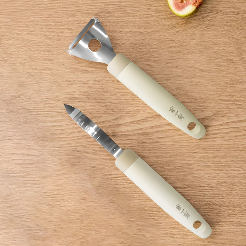 30Cr13 steel Y-type peeler with ergonomic beige handle, ideal for smooth peeling of fruits and vegetables. Durable kitchen tool by Zhang Xiaoquan AU.