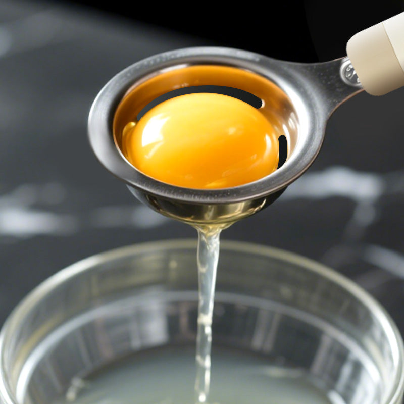 Close-up of 210mm 430 steel egg separator with enlarged drainage holes, showing clean yolk separation for baking and cooking tasks.