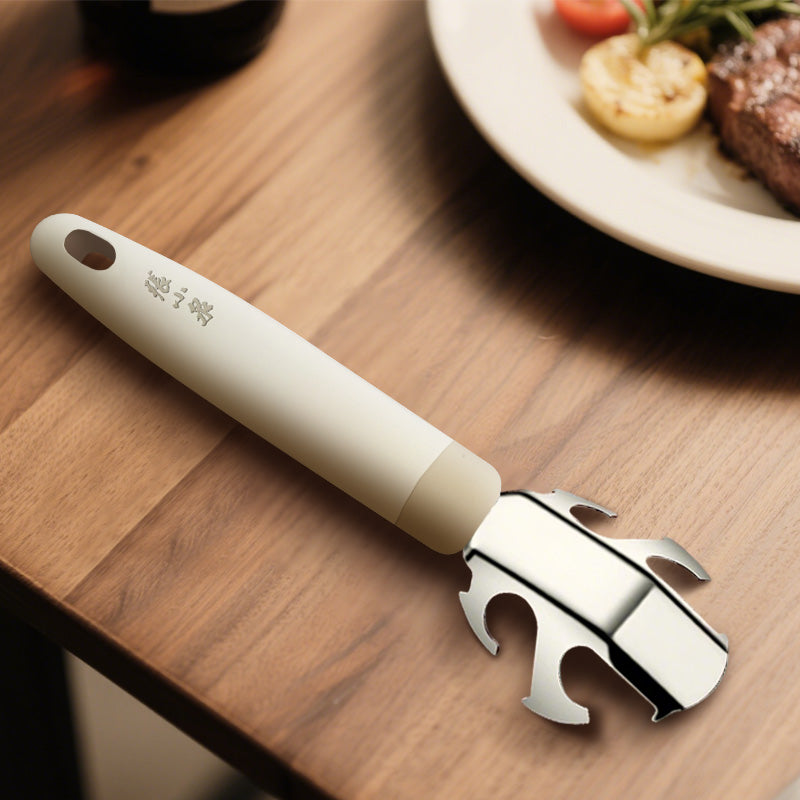 Zhang Xiaoquan AU 195mm 430 steel plate gripper resting on a wooden table, perfect for serving hot plates in kitchen and dining settings.