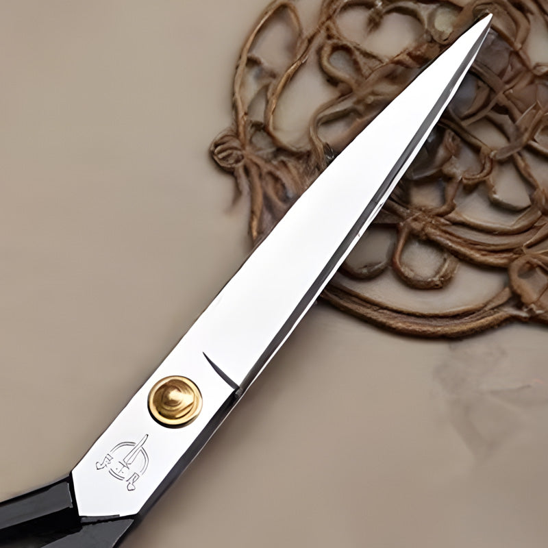 Sharp stainless steel blade of Zhang Xiaoquan AU tailor shears with brass pivot, perfect for clean cuts through thick textiles and fabrics.