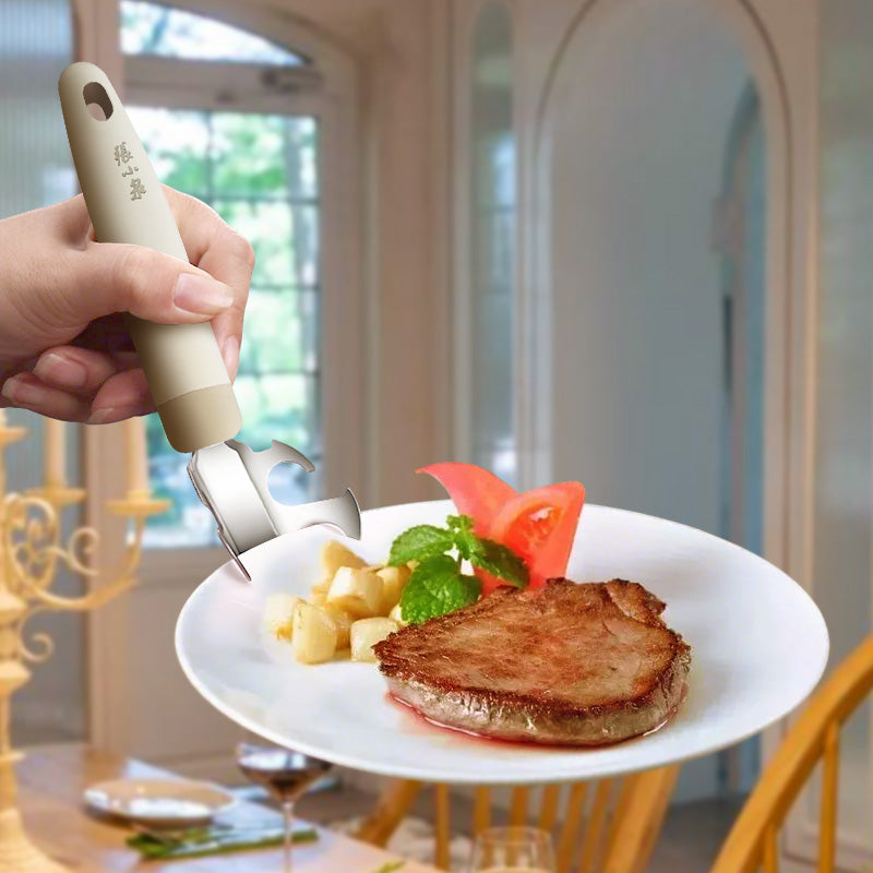 User lifting a hot plate of food using the 195mm heat-resistant stainless steel plate gripper, ideal for safe serving in home kitchens.