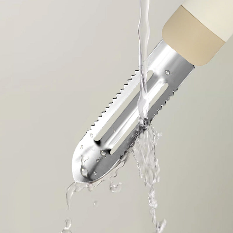 Water rinsing over the 30Cr13 stainless steel fish scale scraper blade, emphasizing its easy-to-clean and rust-resistant properties.