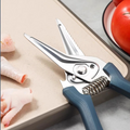 Close-up of 30Cr13 kitchen shears with serrated blades and spring mechanism, designed for efficient meat and bone cutting.