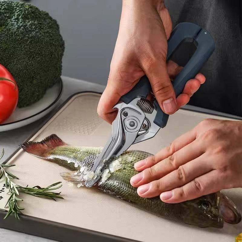 30Cr13 spring-assisted kitchen shears cutting fish scales on a cutting board, showcasing precision and multi-functionality.