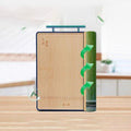 Eco-friendly bamboo cutting board with green arrows showing natural bamboo layer, emphasizing sustainable kitchen utensil construction.