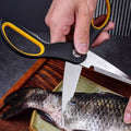 230mm kitchen scissors scaling a fish. Multipurpose shears designed for seafood prep with corrosion-resistant stainless steel blades.