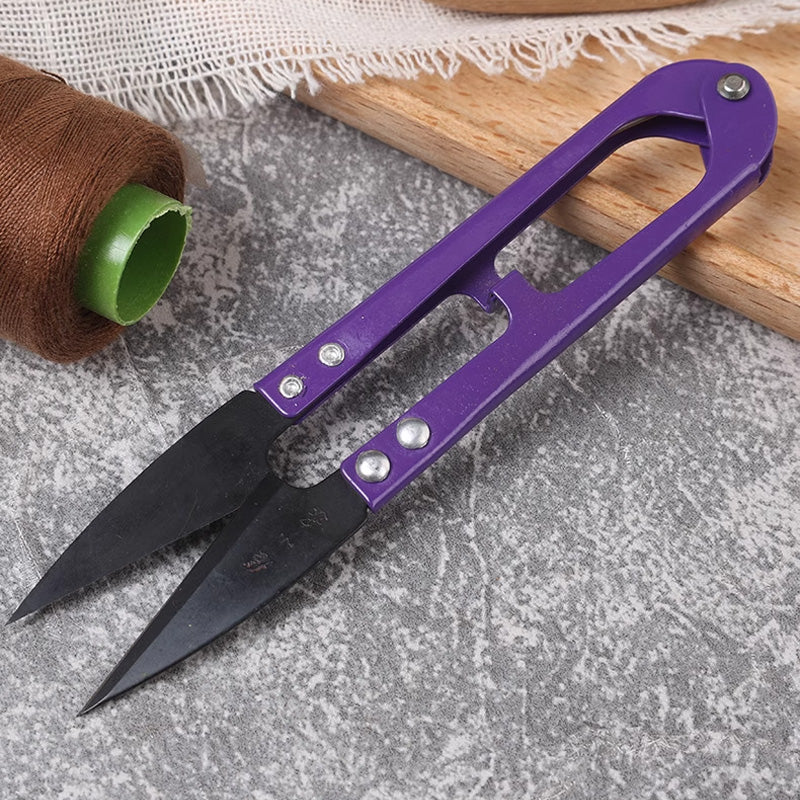 135mm purple thread snips from Zhang Xiaoquan AU sewing set, featuring spring-loaded design and sharp blades for precise yarn trimming.