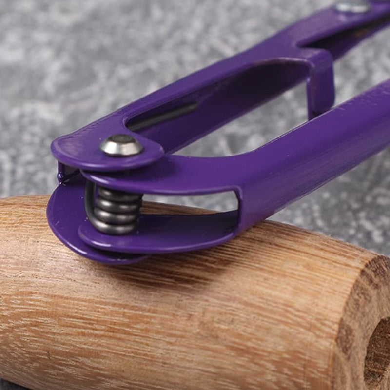 Spring mechanism detail of Zhang Xiaoquan AU thread snips, ensuring smooth and effortless cutting action for sewing and embroidery tasks.