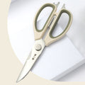 Close-up of 225mm 30Cr13 multipurpose kitchen scissors with serrated blades and dual-color handles, ideal for cutting meat and vegetables.