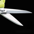 Close-up of sharp 30Cr13 steel blades on durable kitchen shears.