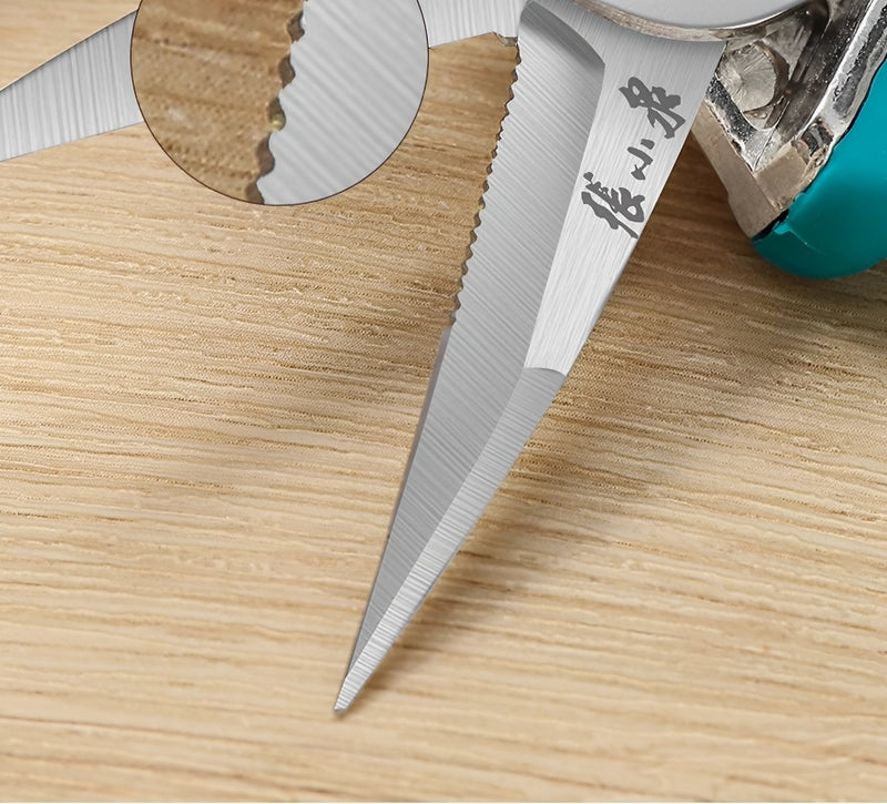 Close-up of micro-serrated stainless steel blades of pruning scissors.