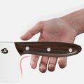 Hand holding the 310mm cleaver, emphasizing the comfortable grip of the polished wooden handle.