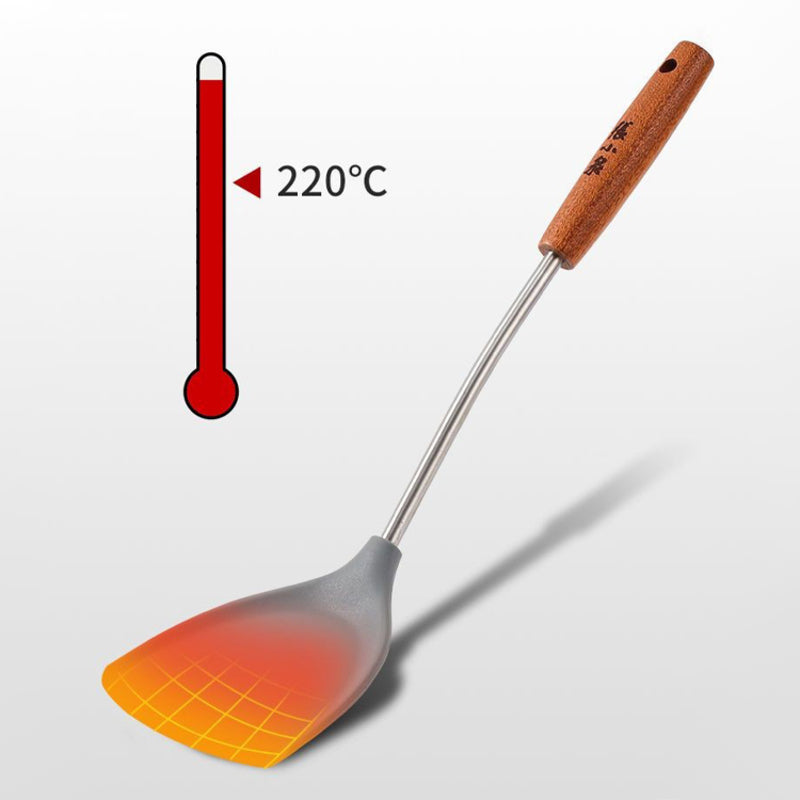 Silicone spatula heat-resistant up to 220°C with ergonomic design.