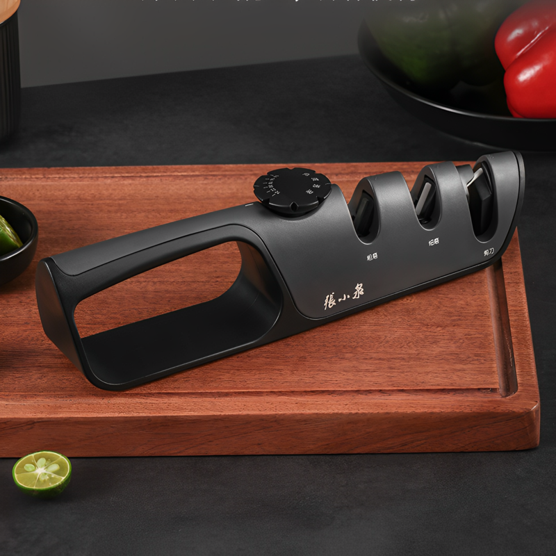 195mm 3-stage sharpener with a sleek black design, placed on a wooden surface alongside fresh vegetables for kitchen use.