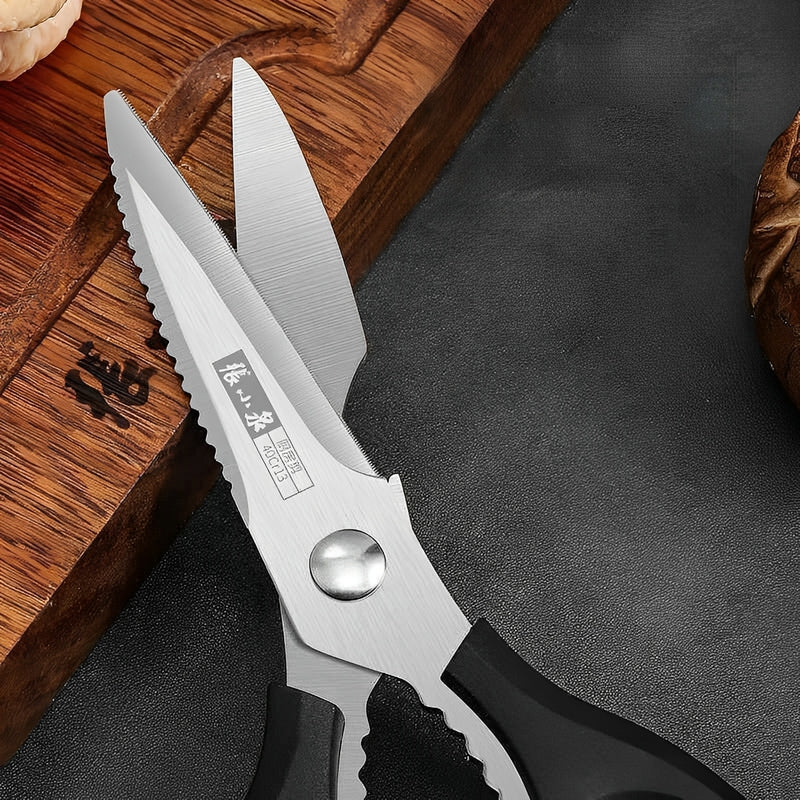 200mm heavy-duty kitchen shears with serrated blades and ergonomic black handles, placed on a wooden cutting board.