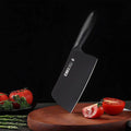 305mm 50Cr15MoV cleaver displayed on a wooden cutting board with sliced tomatoes, showcasing its sharp blade and sleek black design.