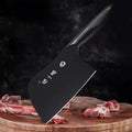 Chinese cleaver chopping raw meat on a wooden cutting board.