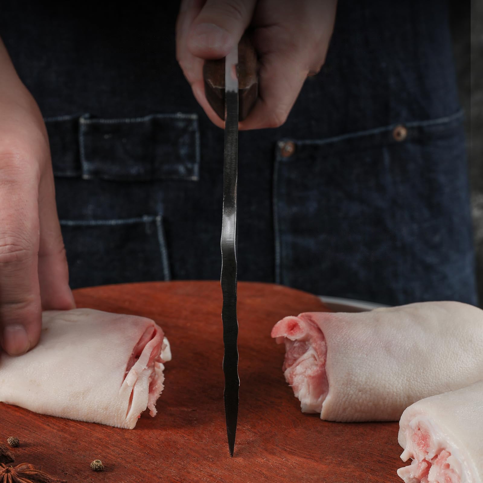 Hand-forged 50Cr15MoV steel knife slicing raw meat on a wooden cutting board, showcasing sharpness and precision for kitchen tasks.