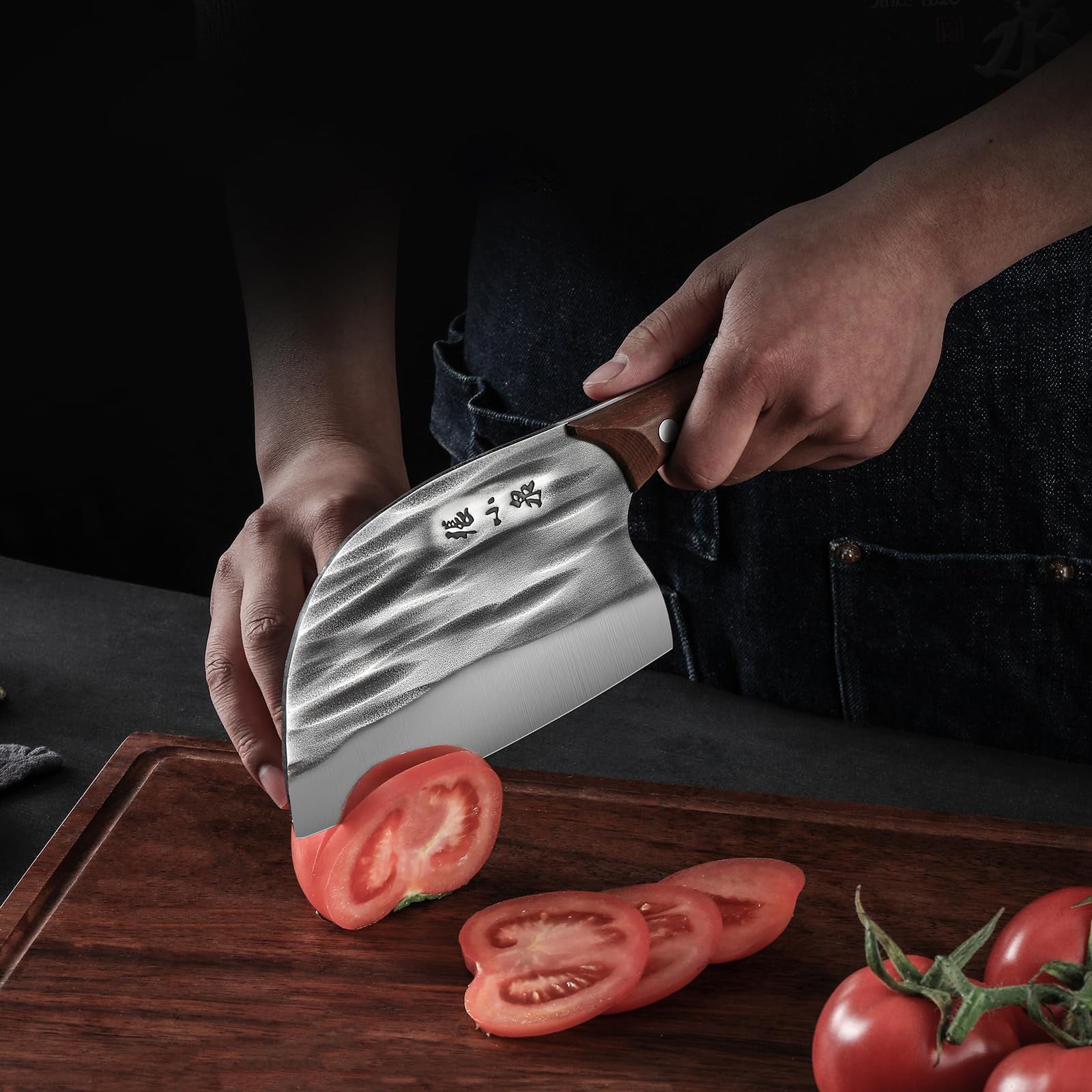 50Cr15MoV hand-forged knife slicing through tomatoes on a wooden cutting board, showcasing its precision and sharpness.